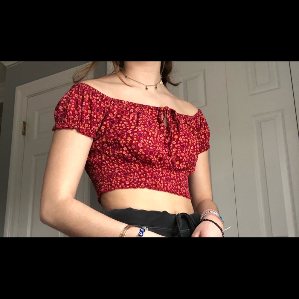 red floral blouse